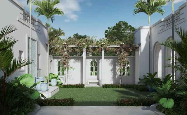 a front view of a house with a garden