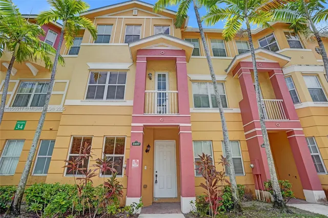 a front view of a multi story residential apartment building