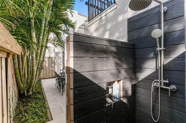 a bathroom with a bathtub and a sink