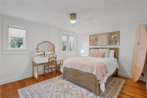 a front view of a house with a yard and a garage