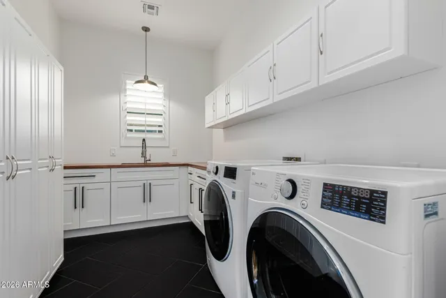 a room with a table and chairs