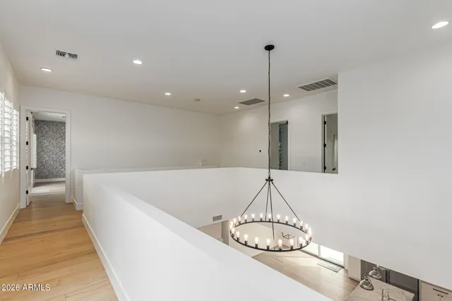 a view of a swimming pool with an outdoor seating