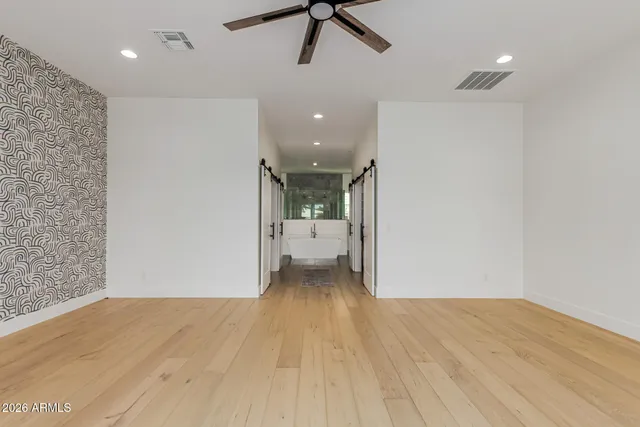a view of an empty walk in closet