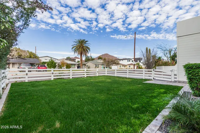 a front view of a house with stairs