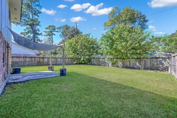 a view of a yard with a slide