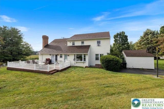 a view of a house with a big yard