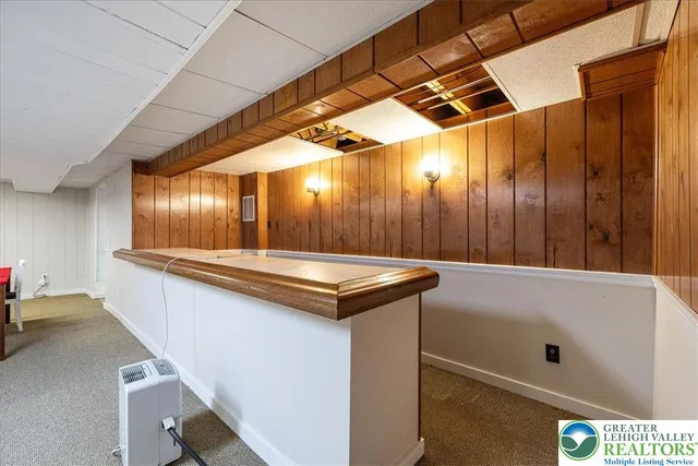 a view of kitchen with furniture and window