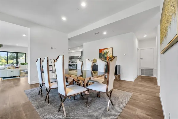 a spacious bathroom with a double vanity sink and a mirror