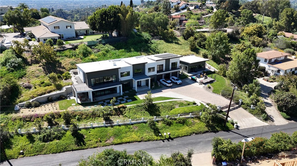 1911 Tumin Road La Habra Heights, CA 90631 - Photo 2 of 43 an aerial view of a house with a yard