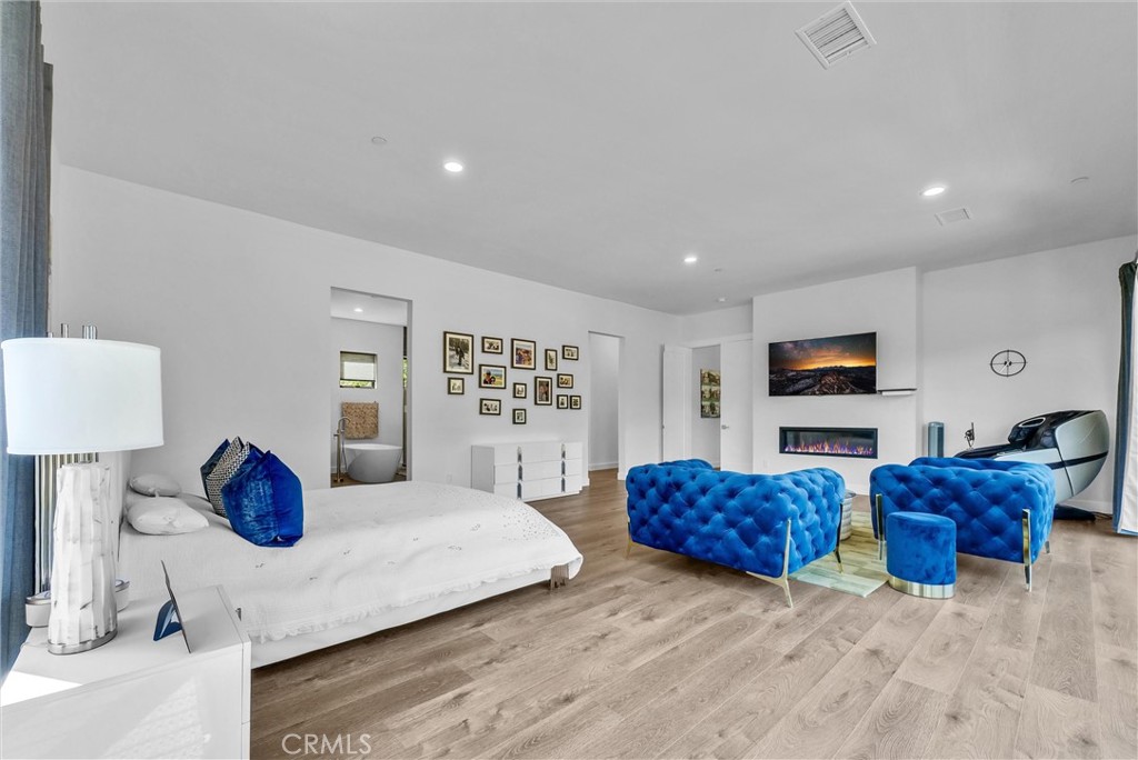 1911 Tumin Road La Habra Heights, CA 90631 - Photo 25 of 43 a living room with furniture and a lamp