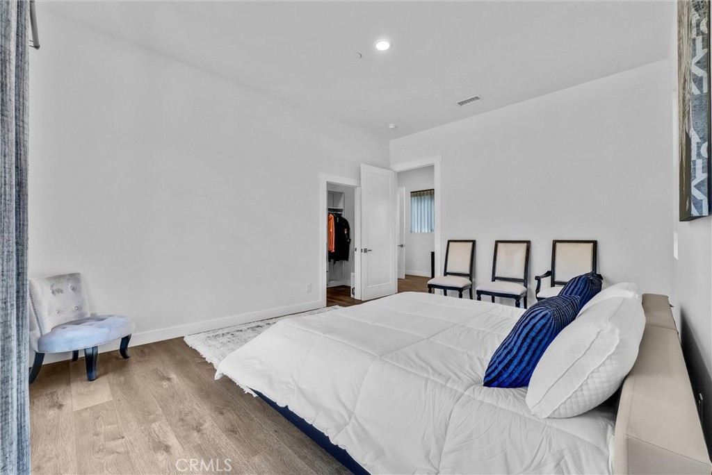 1911 Tumin Road La Habra Heights, CA 90631 - Photo 37 of 43 a bedroom with a bed and a chair