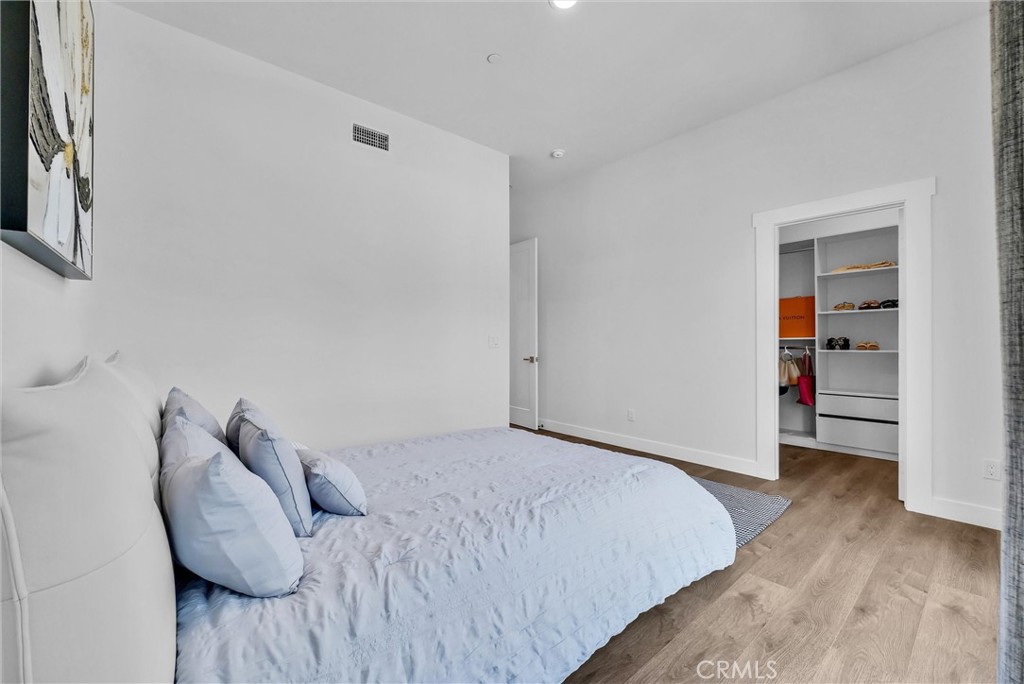 1911 Tumin Road La Habra Heights, CA 90631 - Photo 39 of 43 a bedroom with a bed and a closet