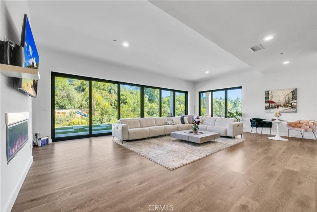 1911 Tumin Road La Habra Heights, CA 90631 - Photo 7 of 43 a living room with furniture and a large window