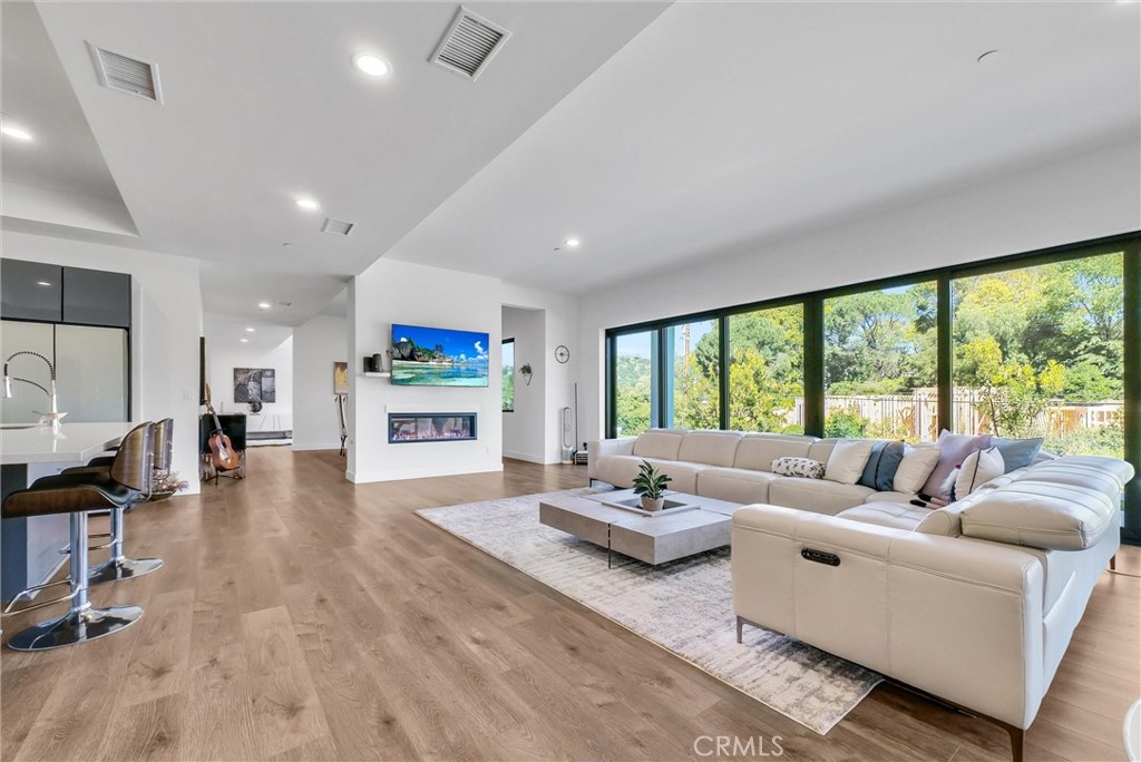 1911 Tumin Road La Habra Heights, CA 90631 - Photo 8 of 43 a living room with furniture and a large window
