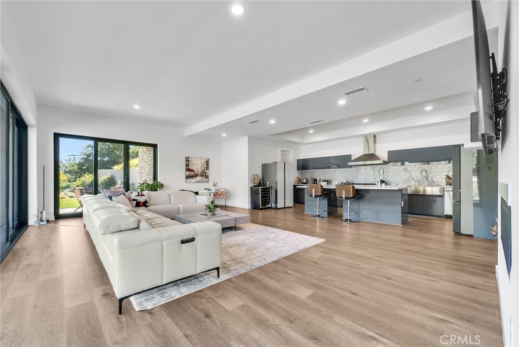 1911 Tumin Road La Habra Heights, CA 90631 - Photo 9 of 43 a living room with furniture and kitchen view
