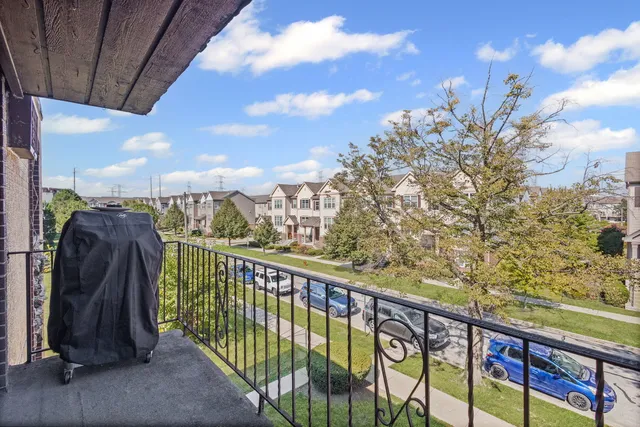 a view of balcony with furniture