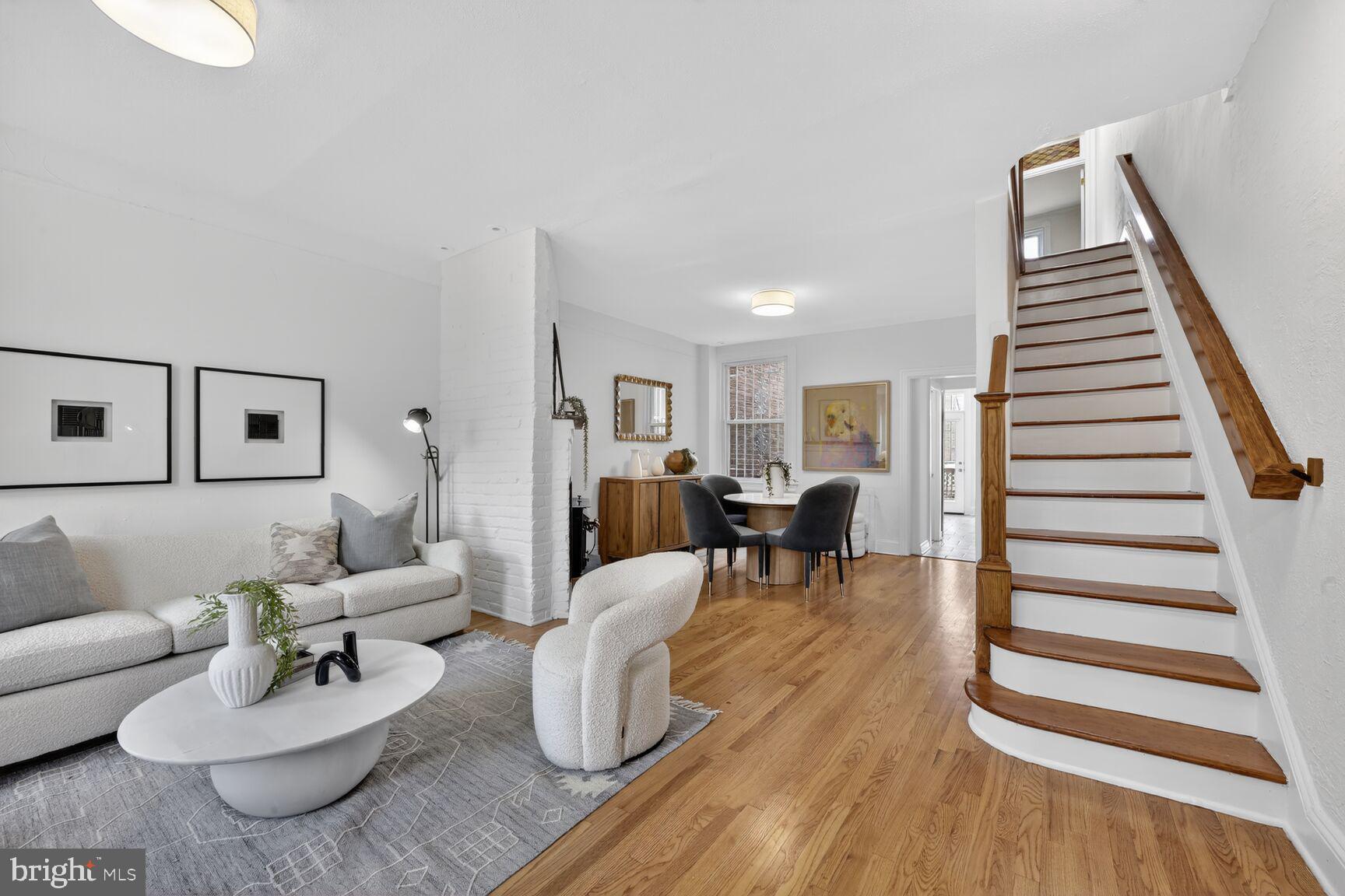 1612 V Street Northwest Washington, DC 20009 - Photo 2 of 29 a living room with furniture and wooden floor