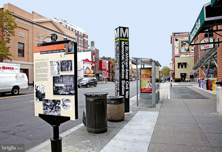 1612 V Street Northwest Washington, DC 20009 - Photo 28 of 29 a street sign on a sidewalk in front of building