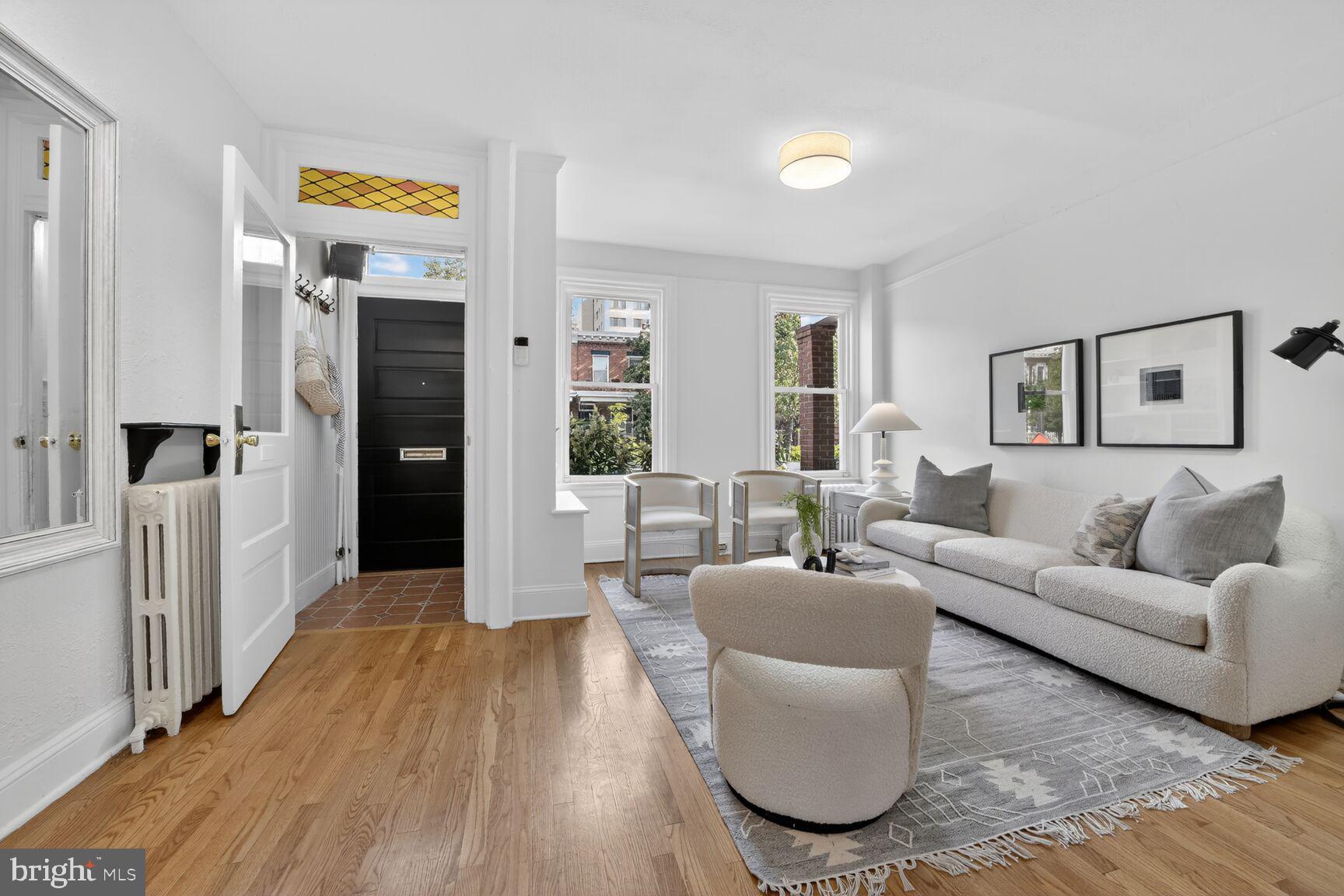 1612 V Street Northwest Washington, DC 20009 - Photo 4 of 29 a living room with furniture and a wooden floor