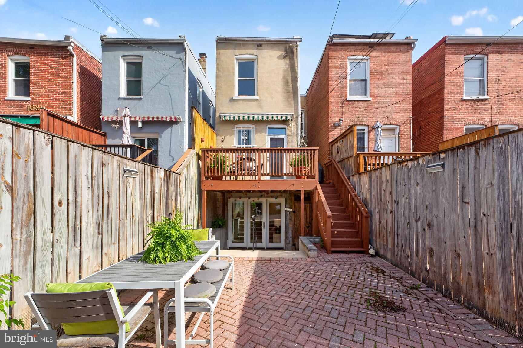 1612 V Street Northwest Washington, DC 20009 - Photo 10 of 29 a view of a house with a patio