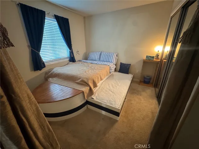 a bathroom with a double vanity sink a and mirror
