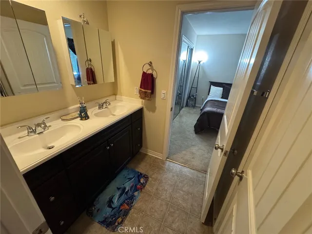 a bathroom with a sink and toilet