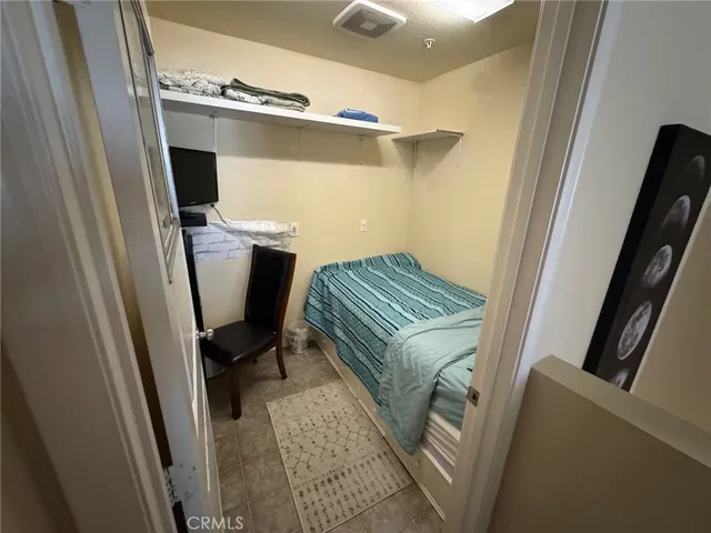 a view of workspace with furniture and wooden floor