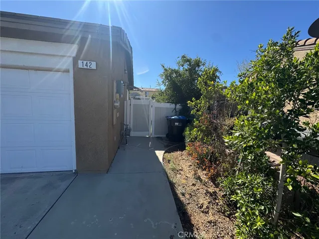 a view of backyard with furniture