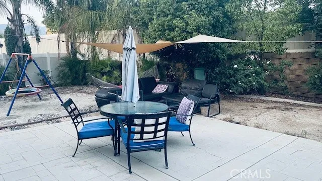 a view of a yard with a tree