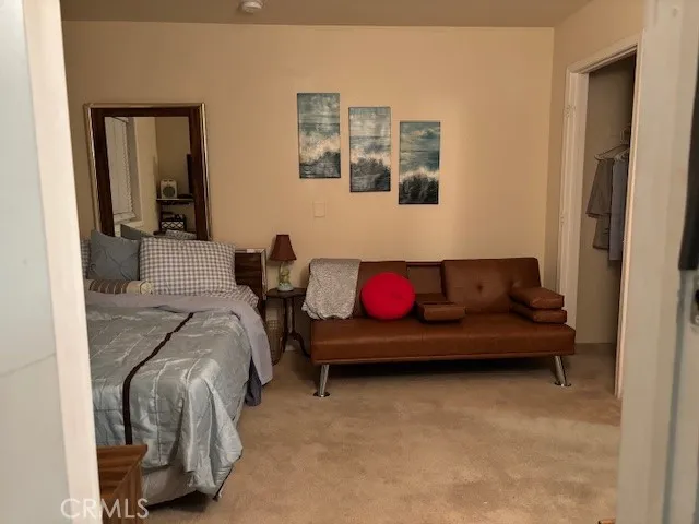 a bathroom with a glass door shower