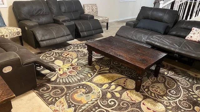 a living room with furniture or couch and a flat screen tv