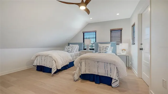 a kitchen that has a table and chairs in it