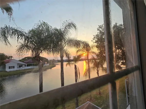 a view of a lake from a balcony