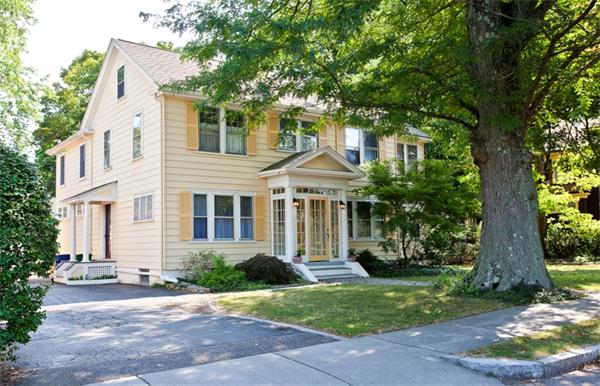 108 Albemarle Road Newton, MA 02460 - Photo 2 of 9 a front view of a house with a garden