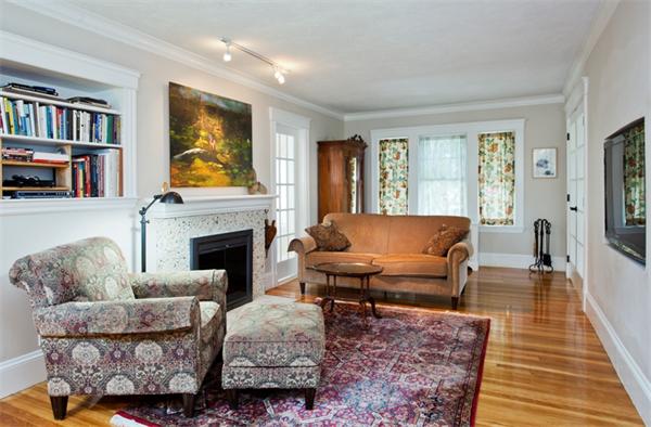 108 Albemarle Road Newton, MA 02460 - Photo 3 of 9 a living room with furniture and a fireplace