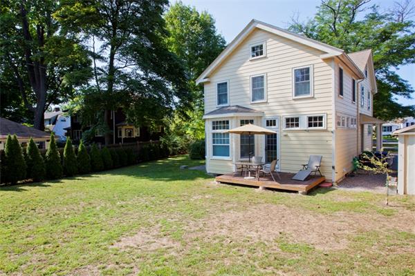 108 Albemarle Road Newton, MA 02460 - Photo 8 of 9 a view of a house with backyard and sitting area