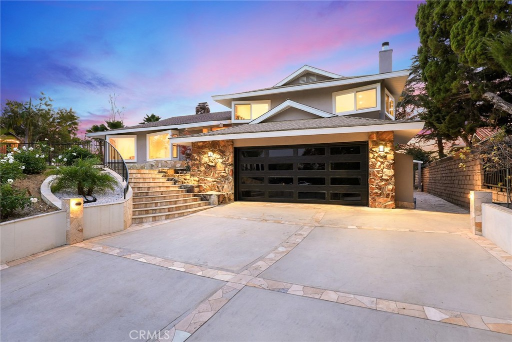 647 Foxbrook Drive Glendora, CA 91740 - Photo 1 of 1 a front view of a house with a yard and garage