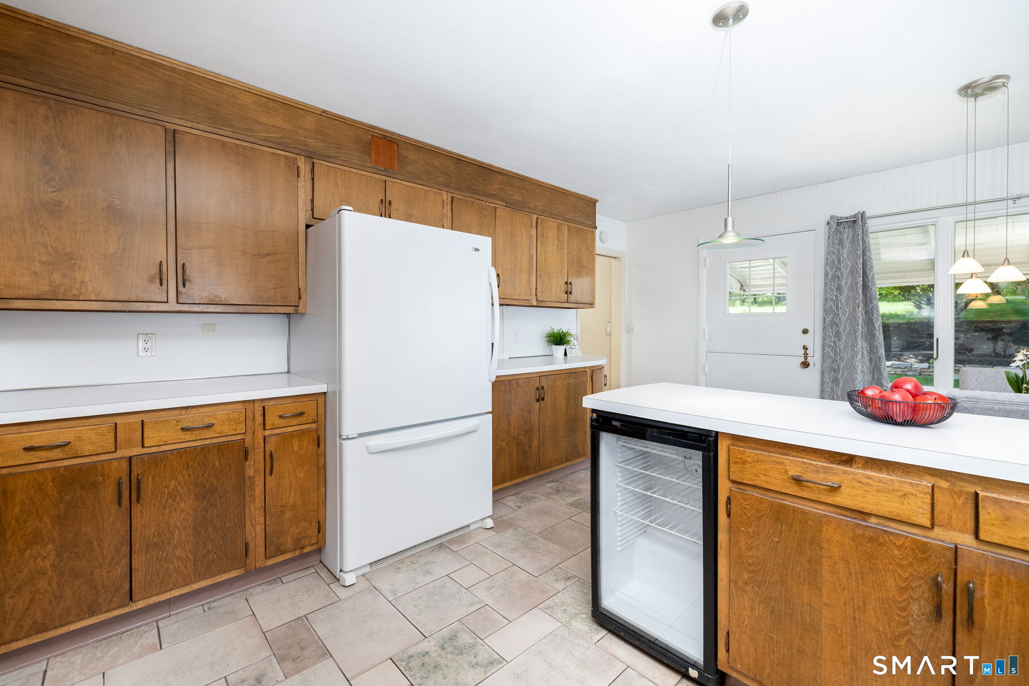 57 Jean Road Manchester, CT 06040 - Photo 15 of 38 a kitchen with a sink cabinets and wooden floor