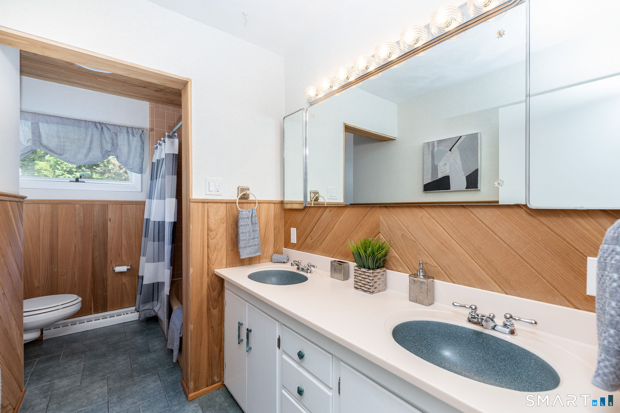 57 Jean Road Manchester, CT 06040 - Photo 20 of 38 a bathroom with a sink double vanity and a mirror