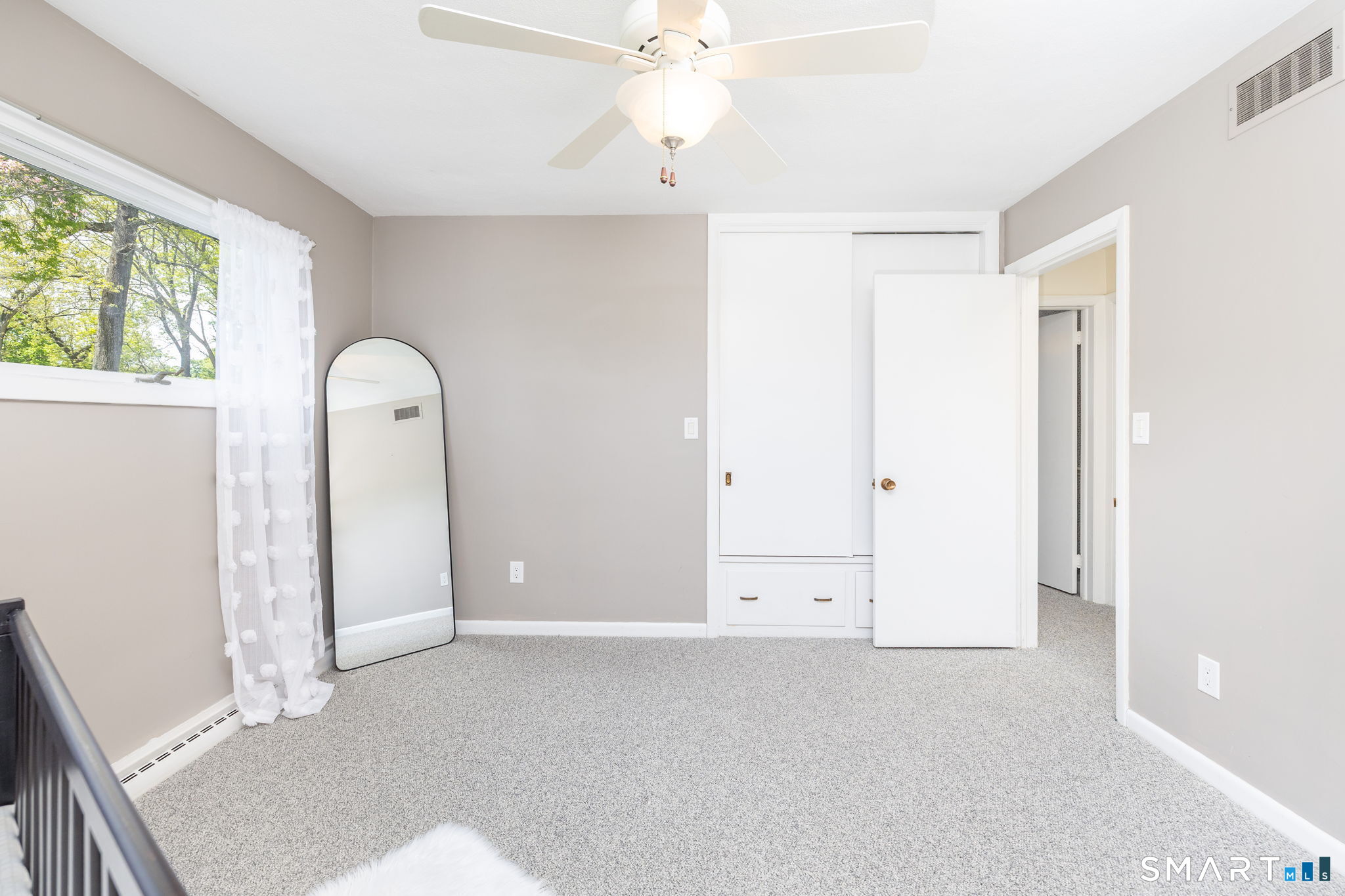 57 Jean Road Manchester, CT 06040 - Photo 22 of 38 an empty room with windows and closet