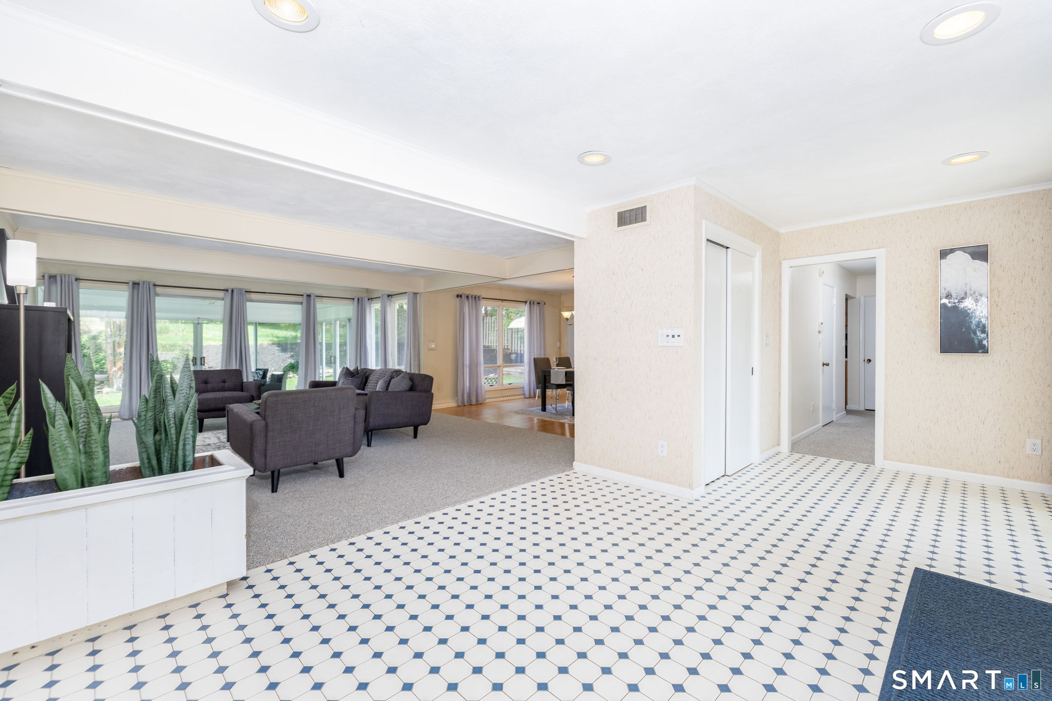 57 Jean Road Manchester, CT 06040 - Photo 7 of 38 a bedroom with a bed and glass door