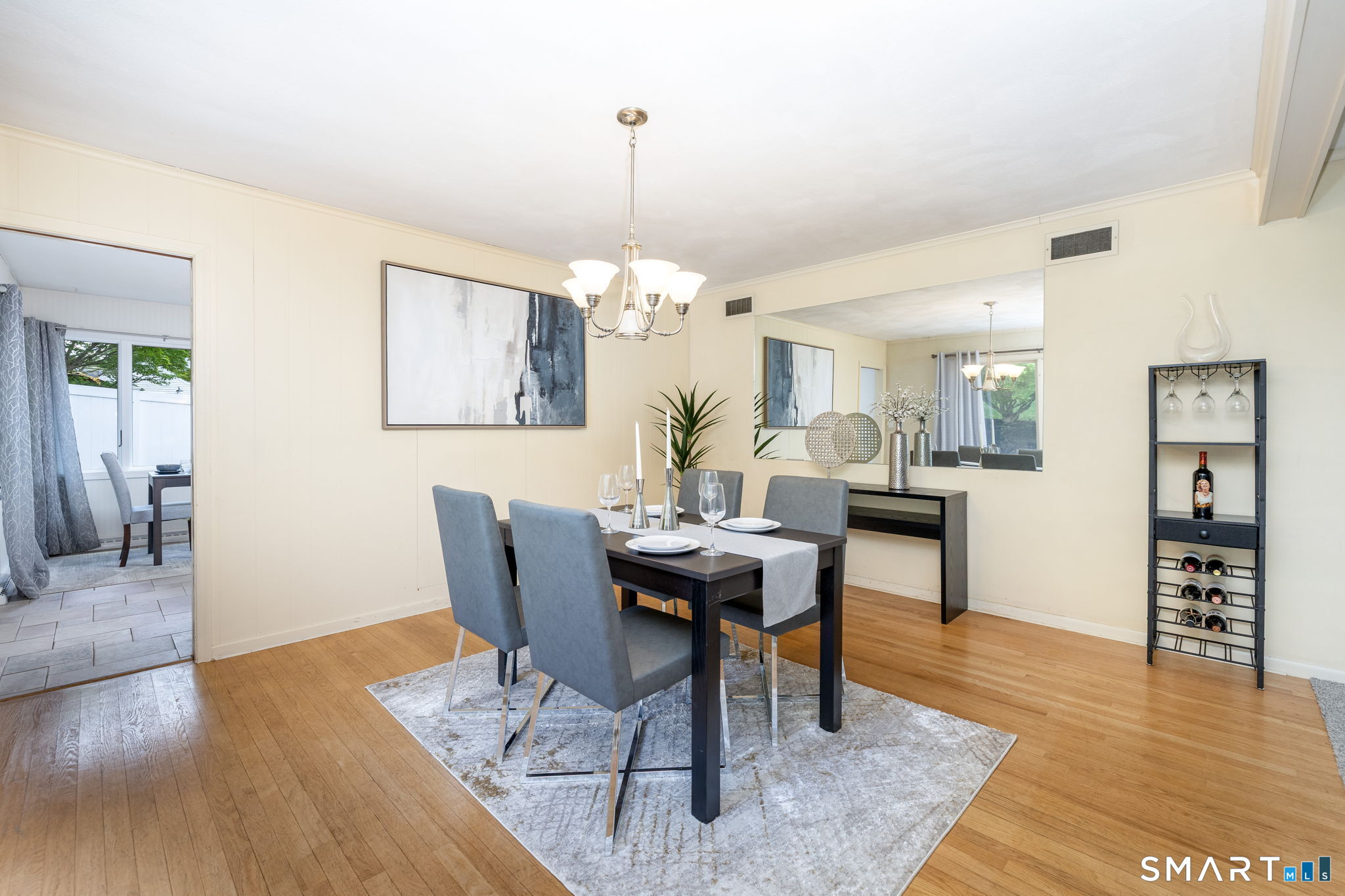 57 Jean Road Manchester, CT 06040 - Photo 10 of 38 a view of a dining room with furniture and wooden floor