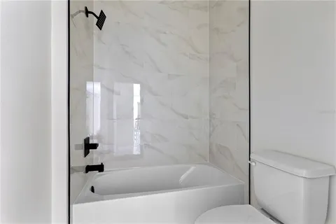 a bathroom with a bathtub