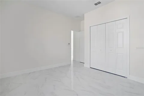 an empty room with an entryway