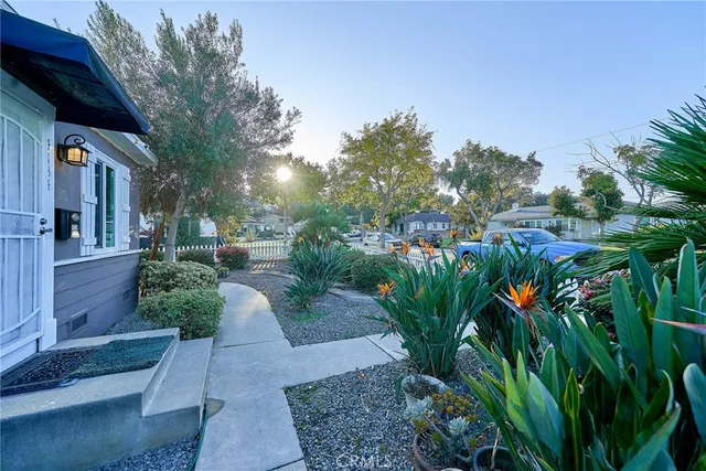 an aerial view of a house with a garden