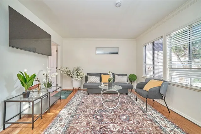 a living room with furniture and a table