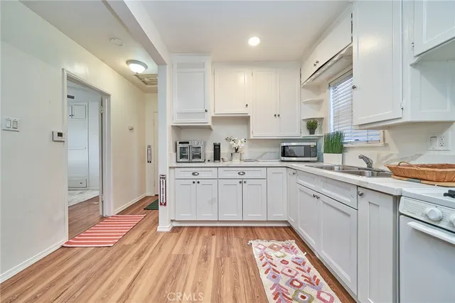 a view of a living room and a rug