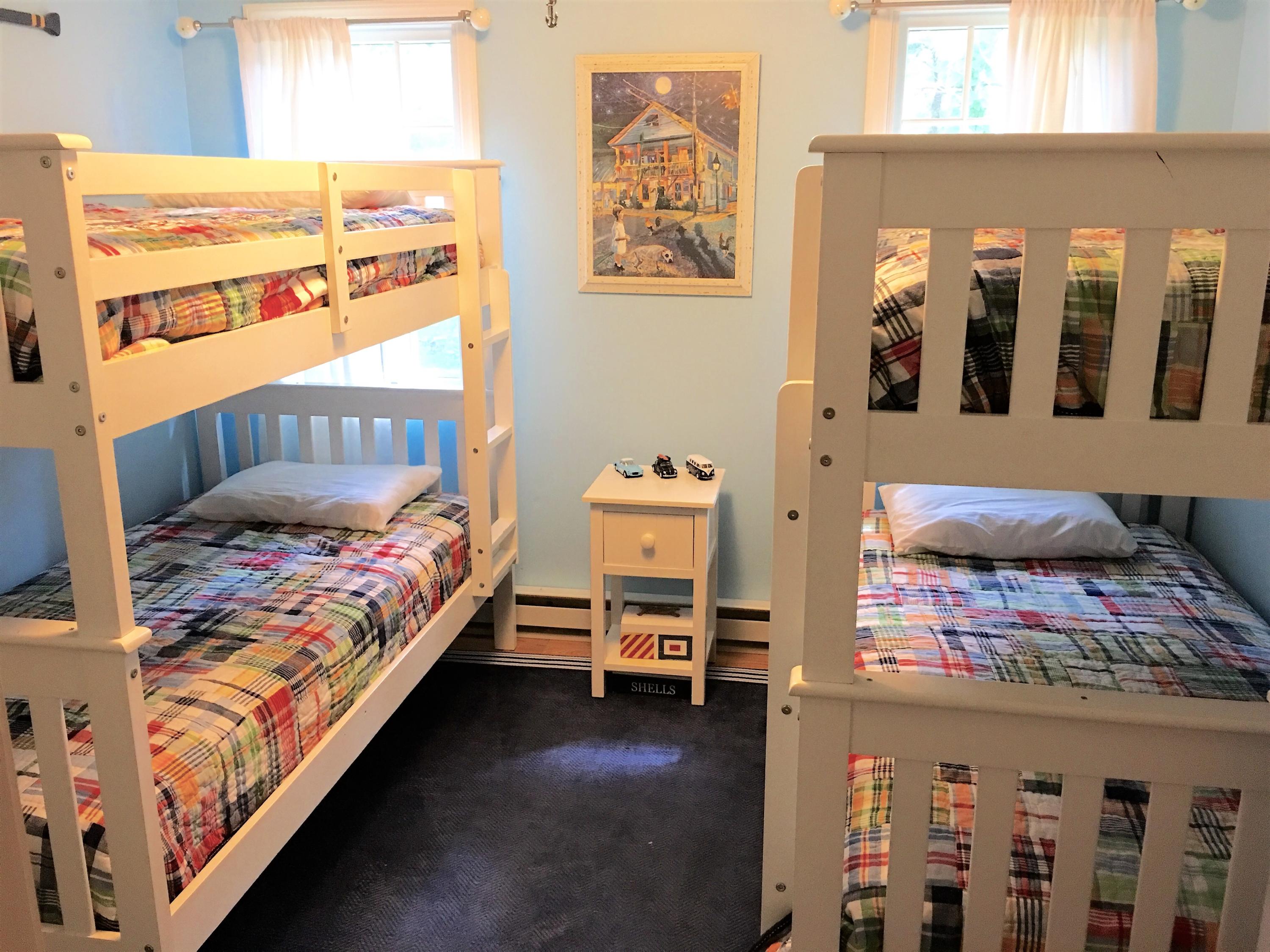 112 3rd Street North Edgartown, MA 02539 - Photo 11 of 15 a bedroom with furniture and a window