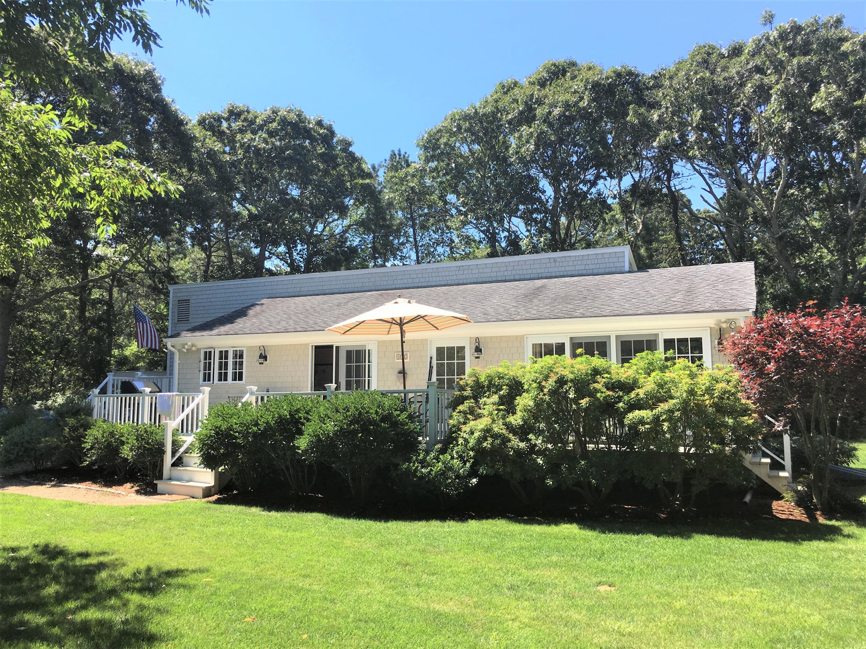 112 3rd Street North Edgartown, MA 02539 - Photo 2 of 15 a front view of house with yard and green space