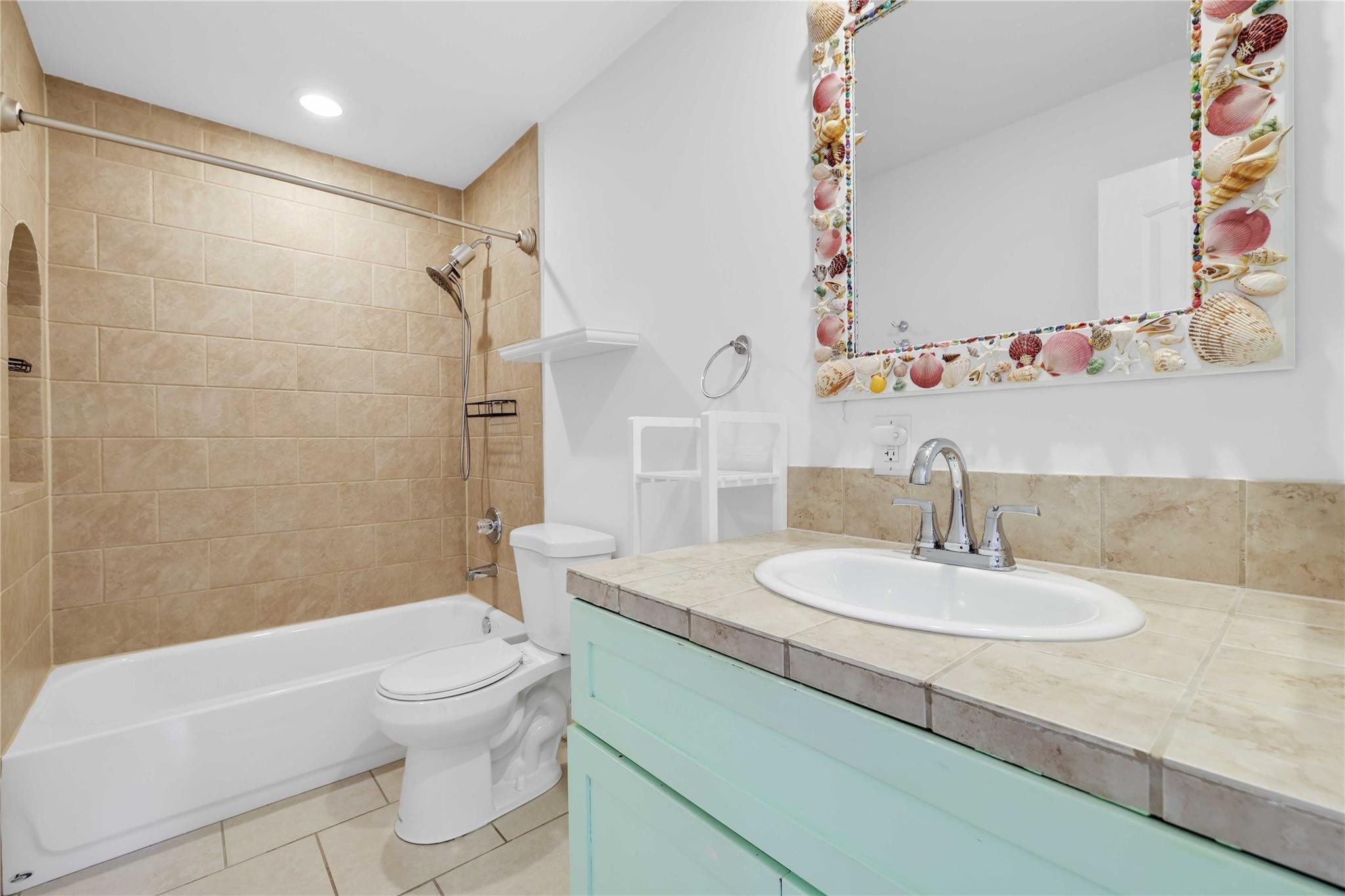 413 Philadelphia Drive Jupiter, FL 33458 - Photo 18 of 35 a bathroom with a sink a toilet and shower